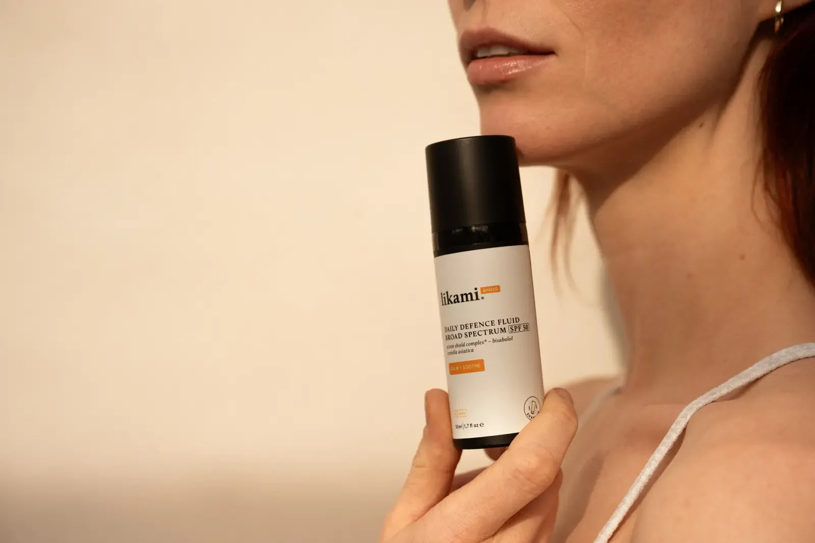 Daily Defence Fluid SPF50: calm + soothe - The Natural Beauty Club