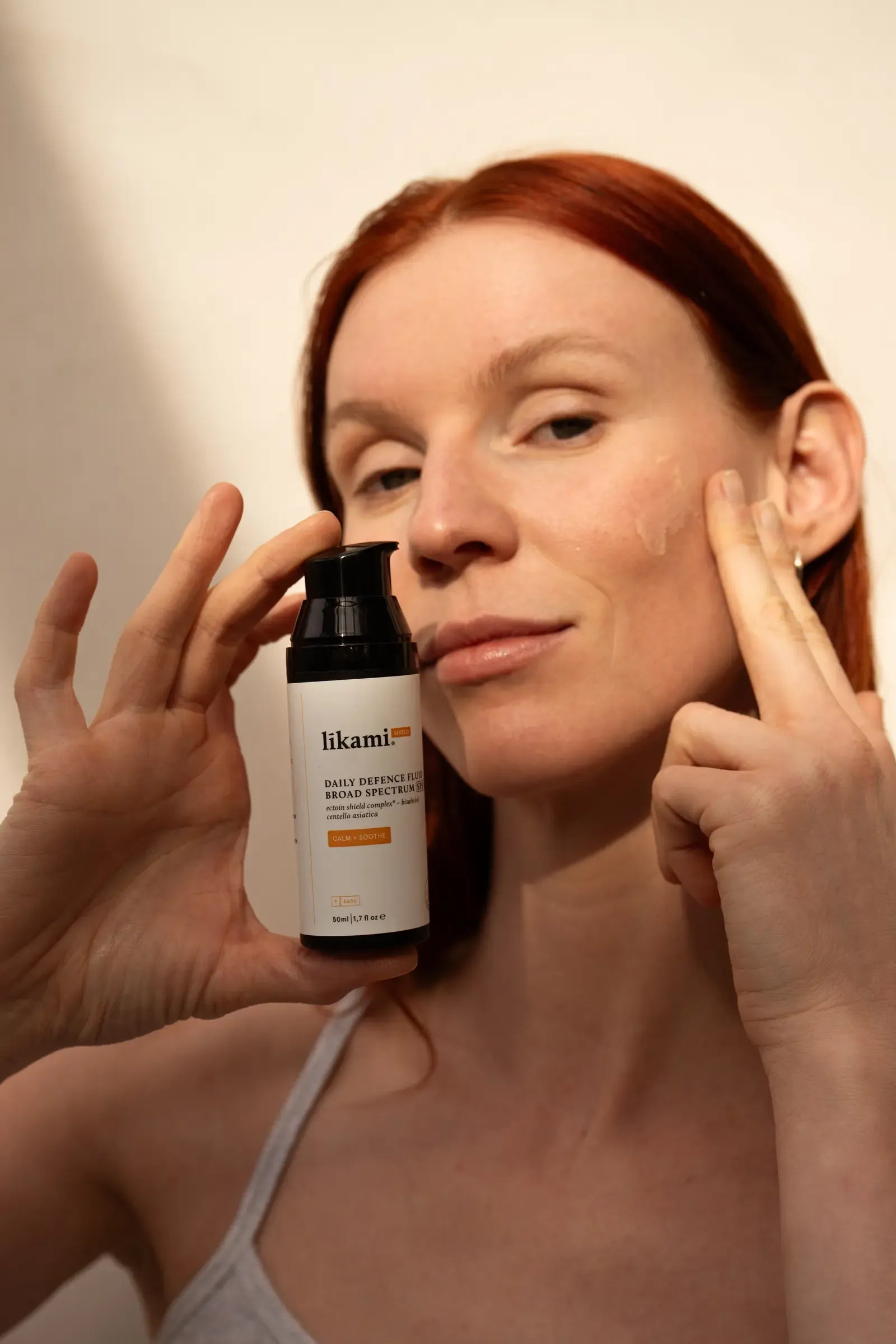 Daily Defence Fluid SPF50: calm + soothe - The Natural Beauty Club